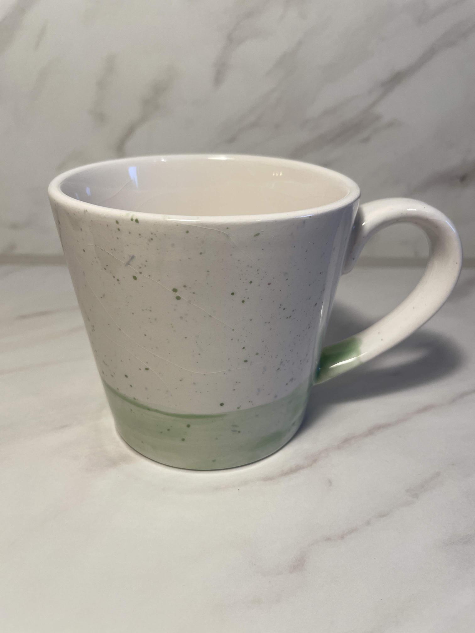Beker met groene onderkant en sprenkels