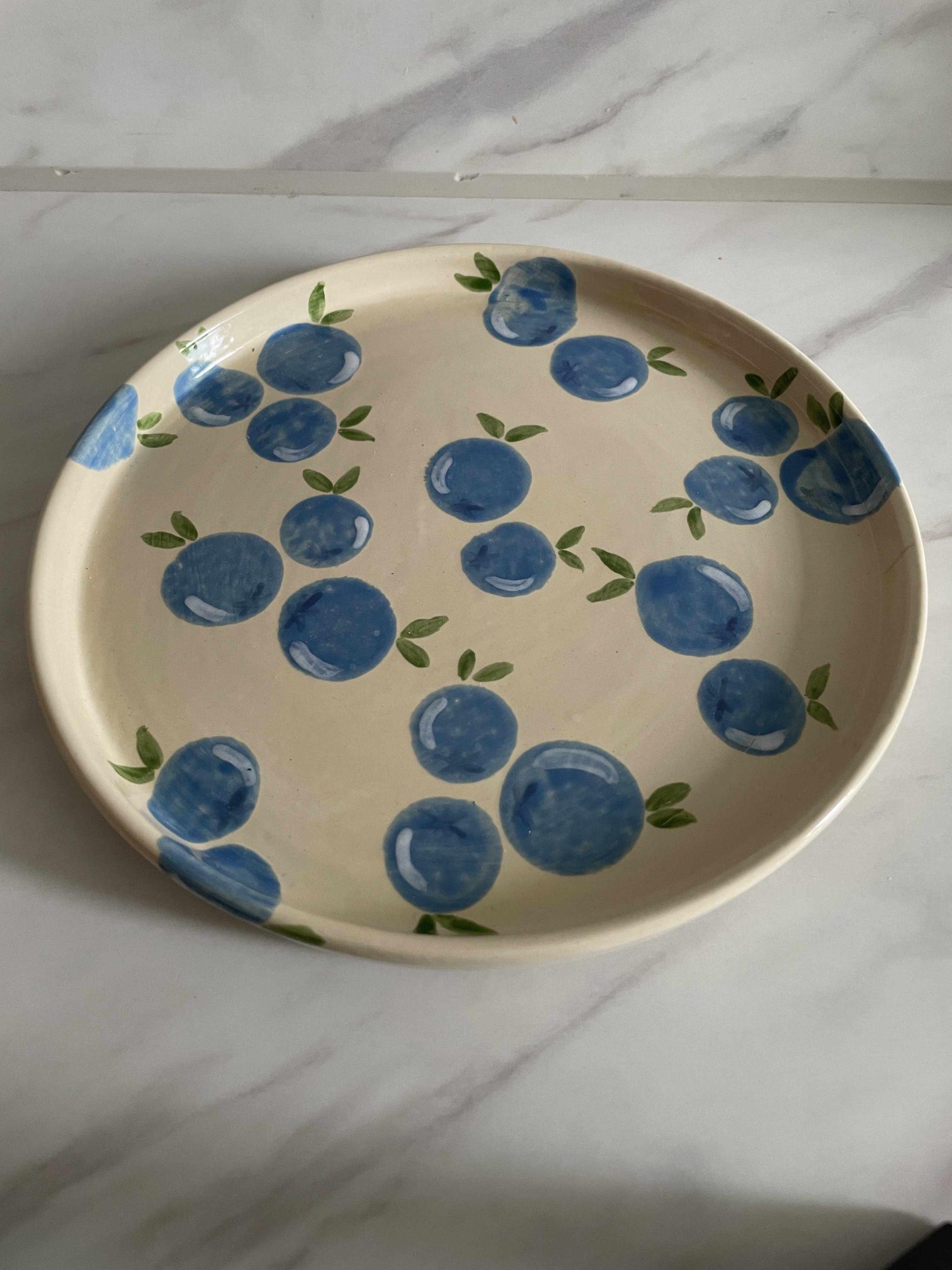 Bord met blauwe bessen